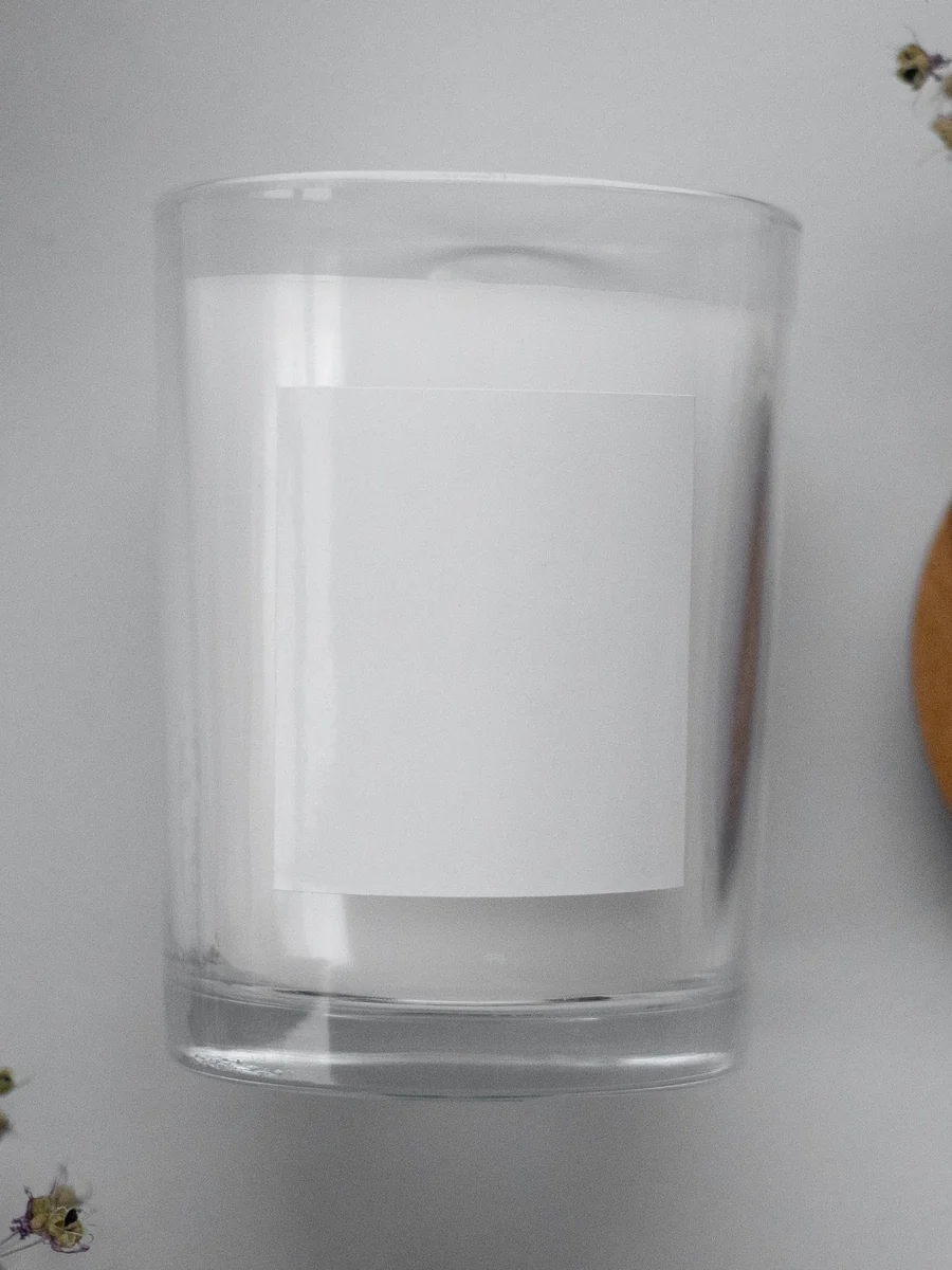 Vela artesanal de café en vaso de vidrio transparente
